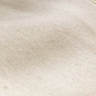 A close up of a natural colored fabric texture