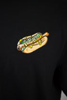 Close up of embroidered Hotdog design on a black T-Shirt by The Embroidery Crew