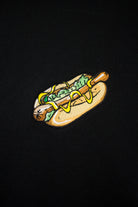 Close up of embroidered Hotdog design on a black Sweatshirt by The Embroidery Crew