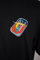 Close up of embroidered Sardines design on a black T-Shirt by The Embroidery Crew