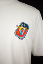 Close up of embroidered Sardines design on a white T-Shirt by The Embroidery Crew